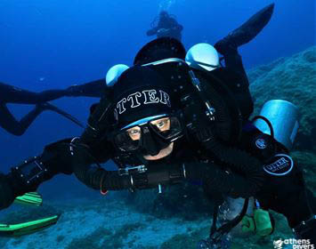 diver with rebreather facing the camera