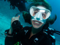 Open water diver female happy female diver underwater